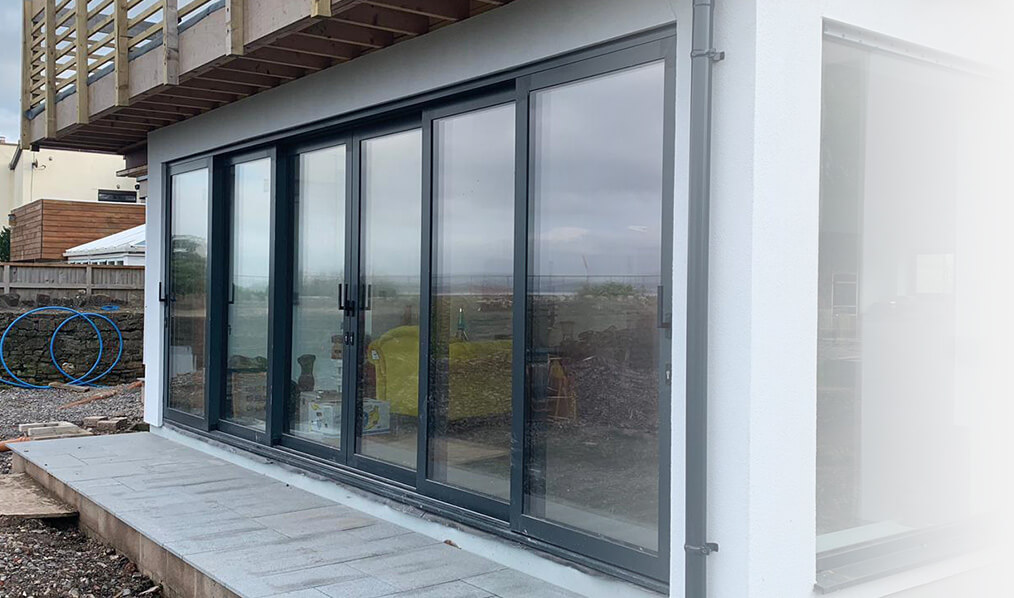 Large black aluminium sliding patio door